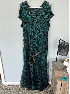 A cotton evening dress for women with a blend of green and black colors